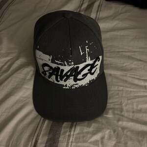 Top Level SAVAGE baseball cap Adjustable. Black. Embroidered